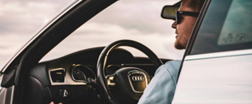 driver sitting in the car looking out